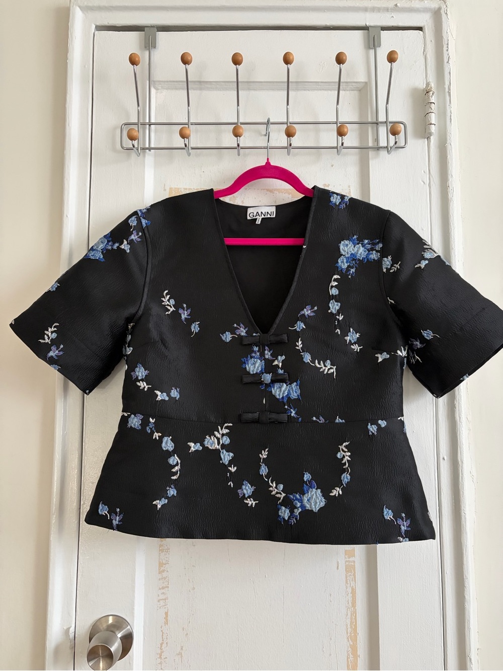 Ganni Black Short-Sleeve V-Neck Top with Blue Floral Print